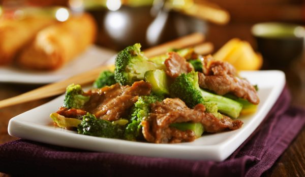 beef and broccoli chinese stirfry on white plate